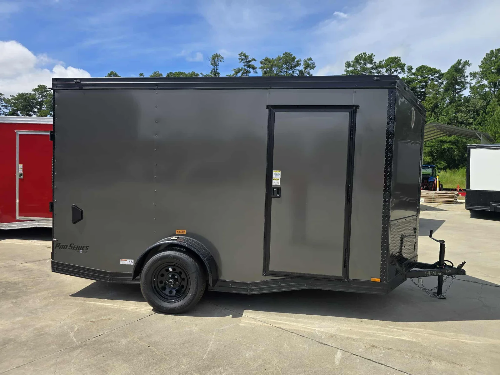 New Enclosed 6x12 Charcoal Cargo Trailer - Image 1