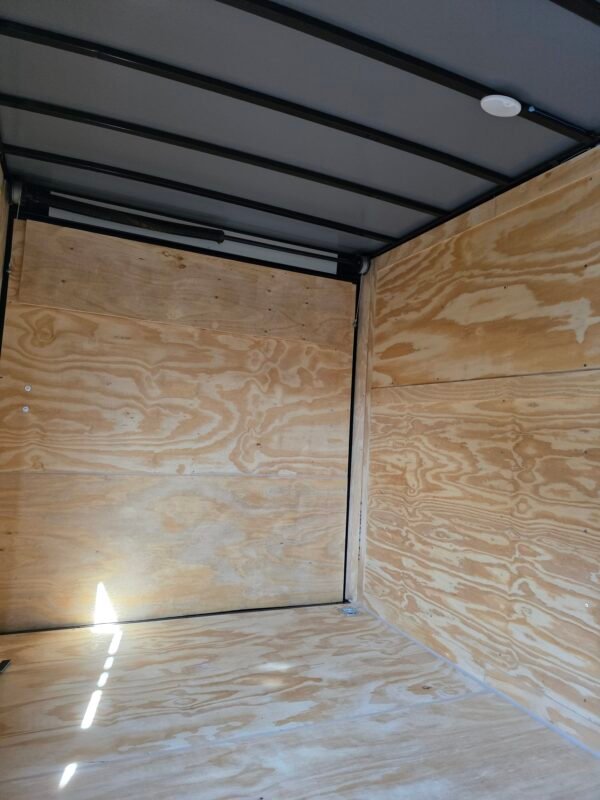 7×12 Cargo Trailer for Sale – Black | 7' Interior | 3500 lb Axles | Rear Ramp w/ Flap | D-Rings | Side Door