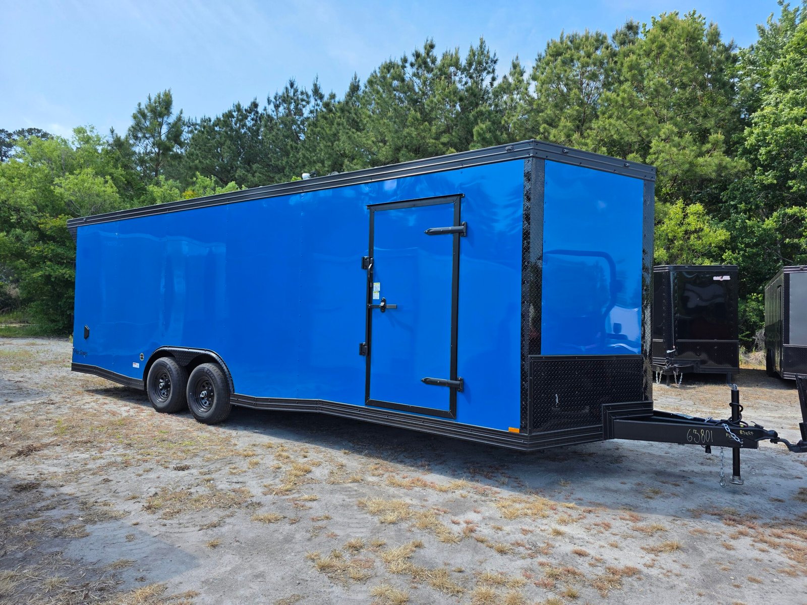 8.5×24 Enclosed Car Hauler Trailer – Pepsi Blue | 5200 lb Axles | Pro Series & Blackout Package - Image 1