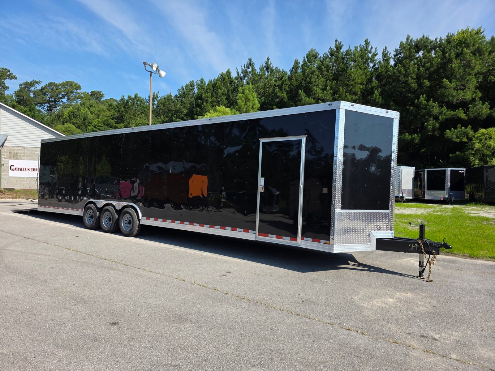 8.5×36 Enclosed Car Hauler for Sale – Black | Triple Axle | 7